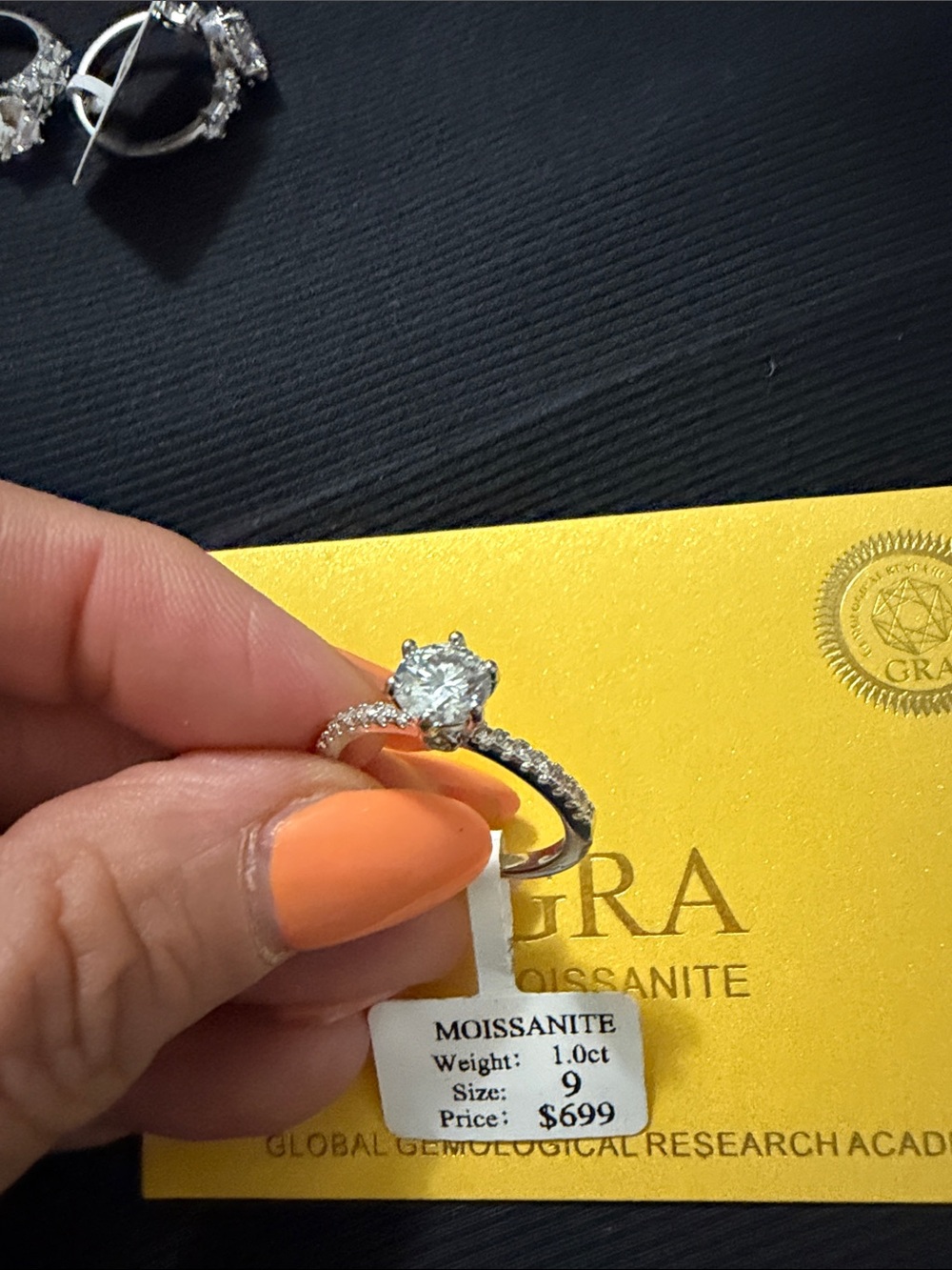 Moissanite Solitaire Engagement Ring in Clear with Pavé Band